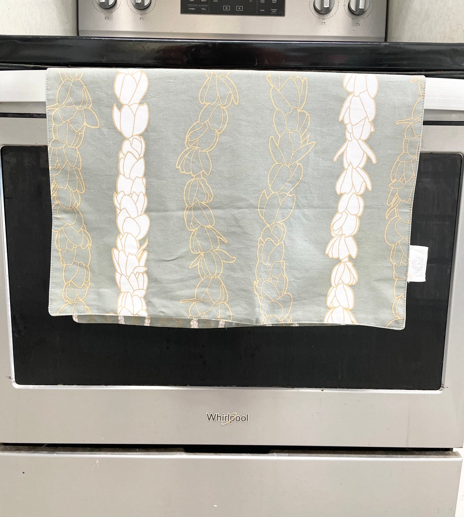 Pop-Up Mākeke - Laha'ole Designs - Pikake Lei Hinahina (Grey) Tea Towel - Back View