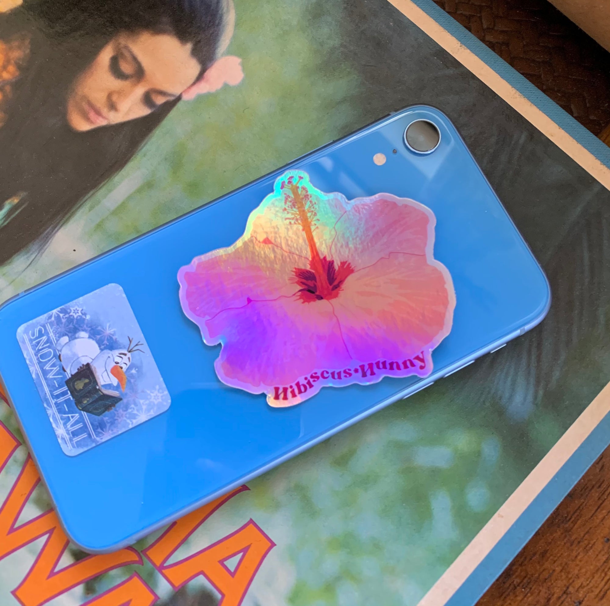 Pop-Up Mākeke - Kahomelani's - Hibiscus Hunny Shiny Holographic Sticker - In Use