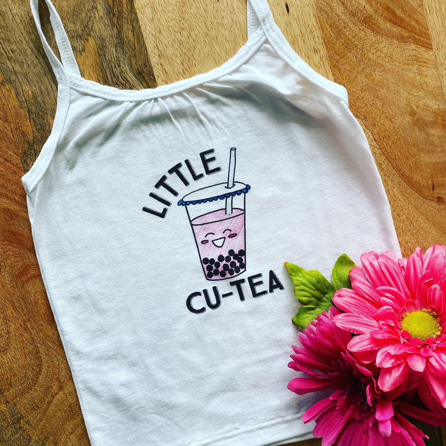 Pop-Up Mākeke - Sal Terrae - Little Cu-Tea Baby Onesie