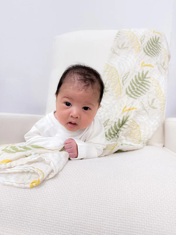 Pop-Up Mākeke - The Keiki Department - Bamboo Muslin Baby Swaddle Blanket - Hapuu Fern - In Use