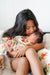 Pop-Up Mākeke - The Keiki Department - Bamboo Muslin Baby Swaddle Blanket - Liko Lehua - In Use