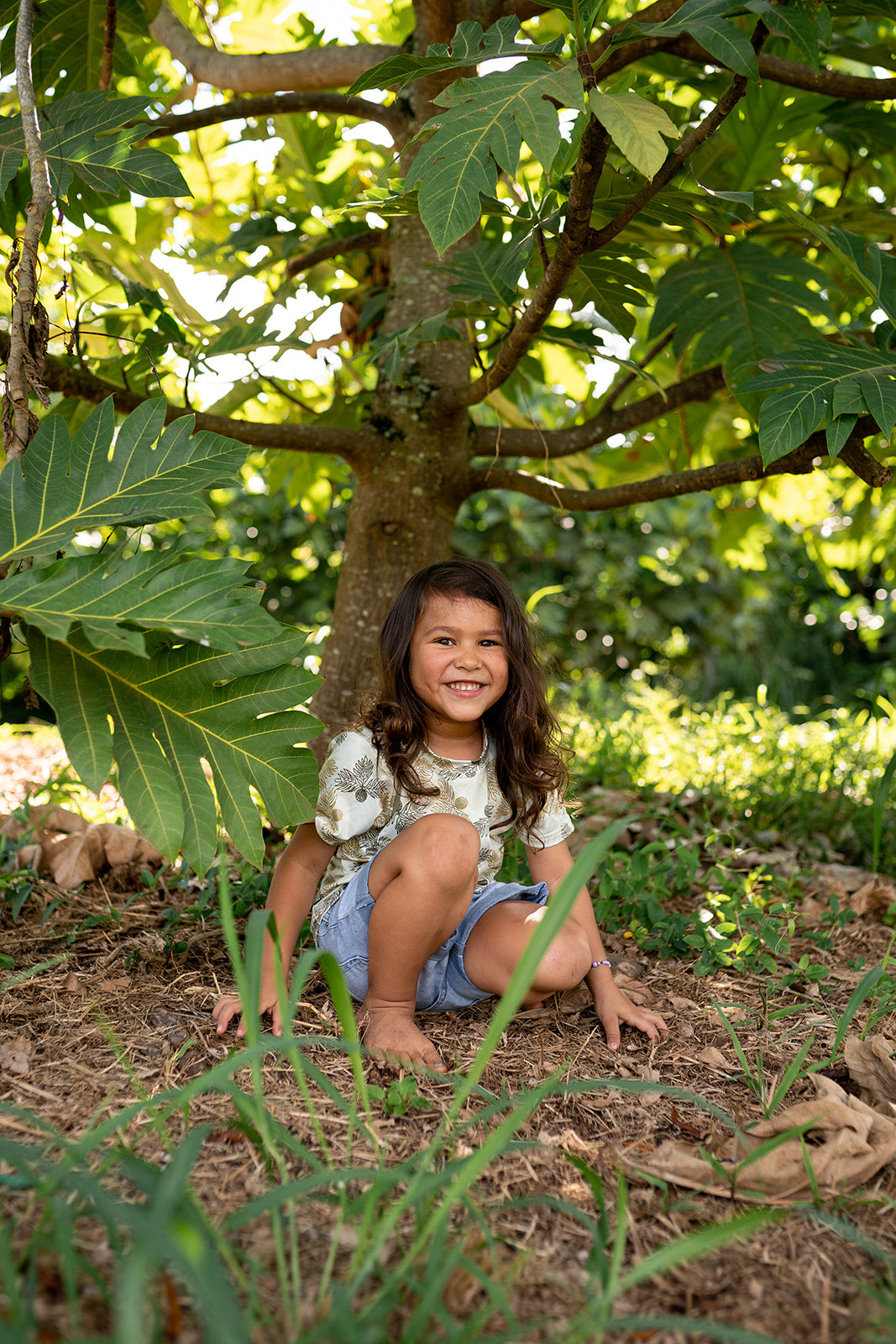 Pop-Up Mākeke - The Keiki Department - Unisex Keiki Short Sleeve T-Shirt - Ulu Green Ulu o Lele - In Use