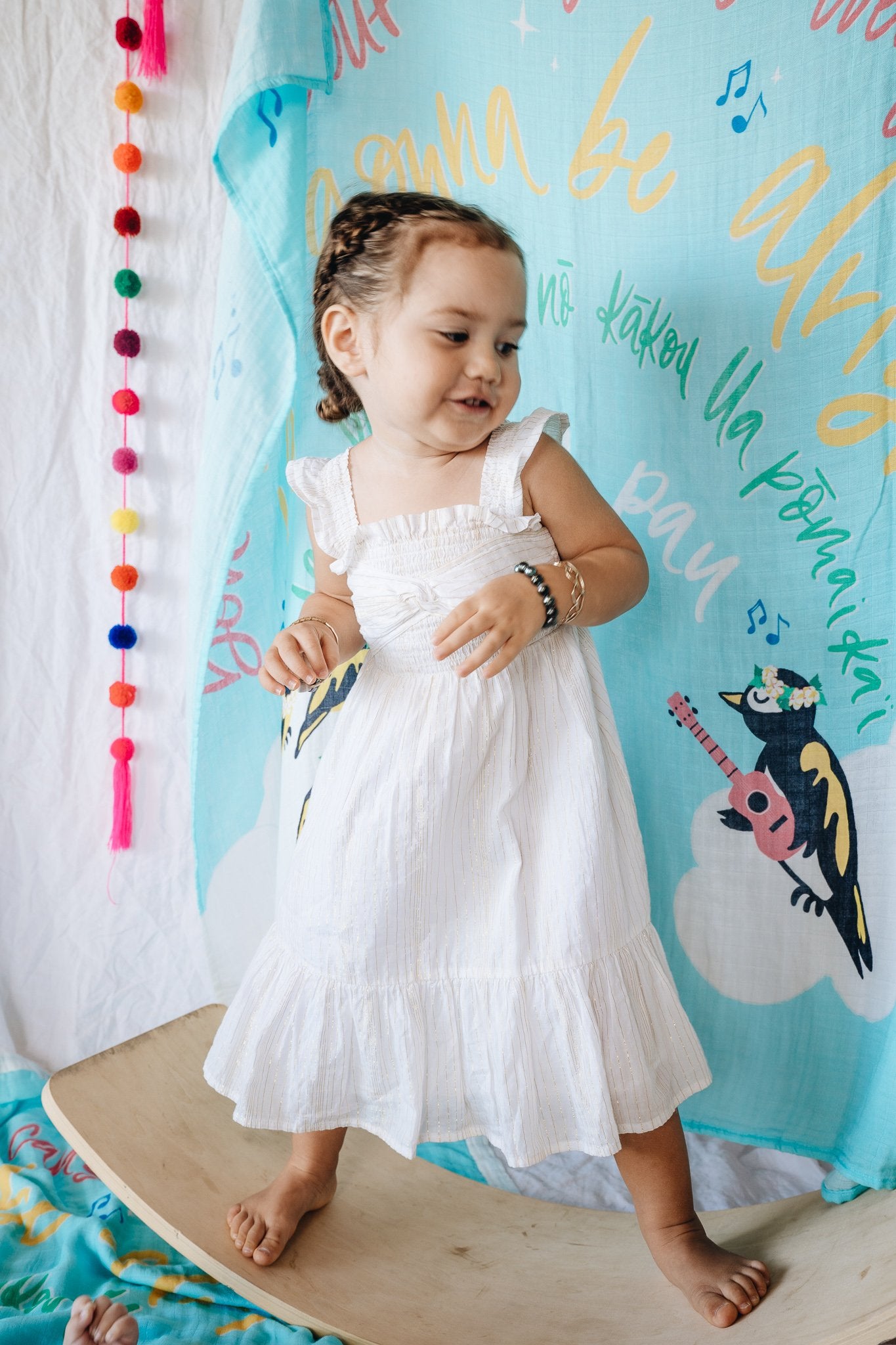 Pop-Up Mākeke - Haku Collective - Three Little Birds Baby Swaddle - In Use