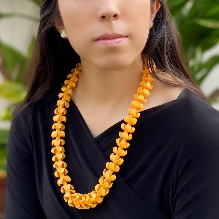 Pop-Up Mākeke - Ohana Expressions - 3rd Day Puakenikeni Lei - 25" - Orange - In Use