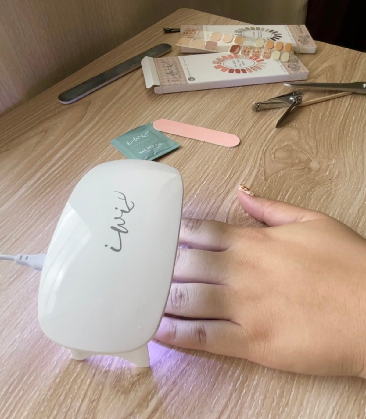 Pop-Up Mākeke - Gel Nail Strips - ʻOno & ʻAwa x Iwi Nails Aloha (For Keiki/Kids) - Gel Lamp in Use