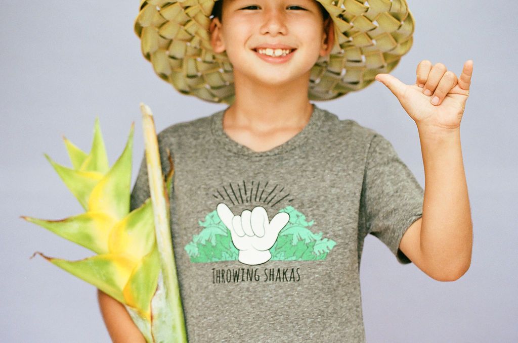 Pop-Up Mākeke - Izzy and Luke - Throwing Shakas Keiki Short Sleeve T-Shirt - Close Up