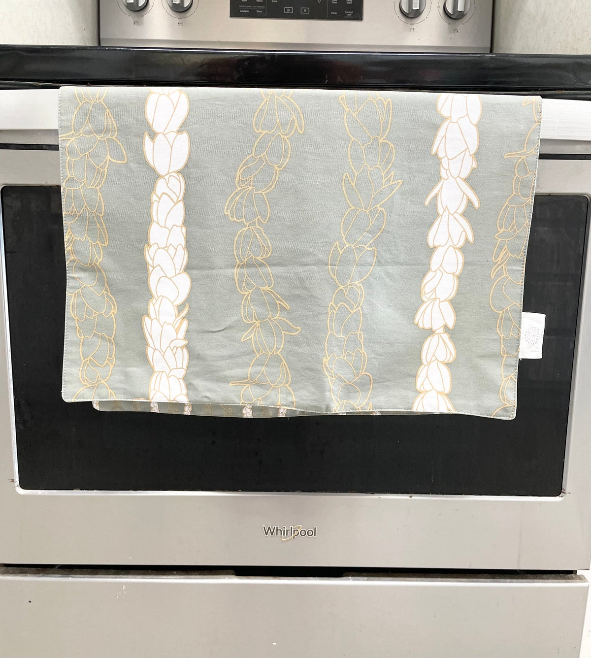 Pop-Up Mākeke - Laha'ole Designs - Pikake Lei Hinahina (Grey) Tea Towel - Back View