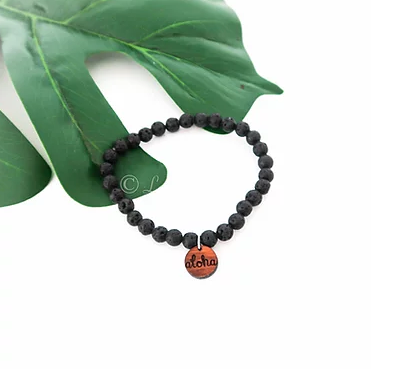 Lava Bead bracelet with Koa Charm